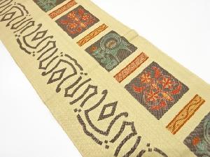 抽象動物に草花模様織り出し　袋帯